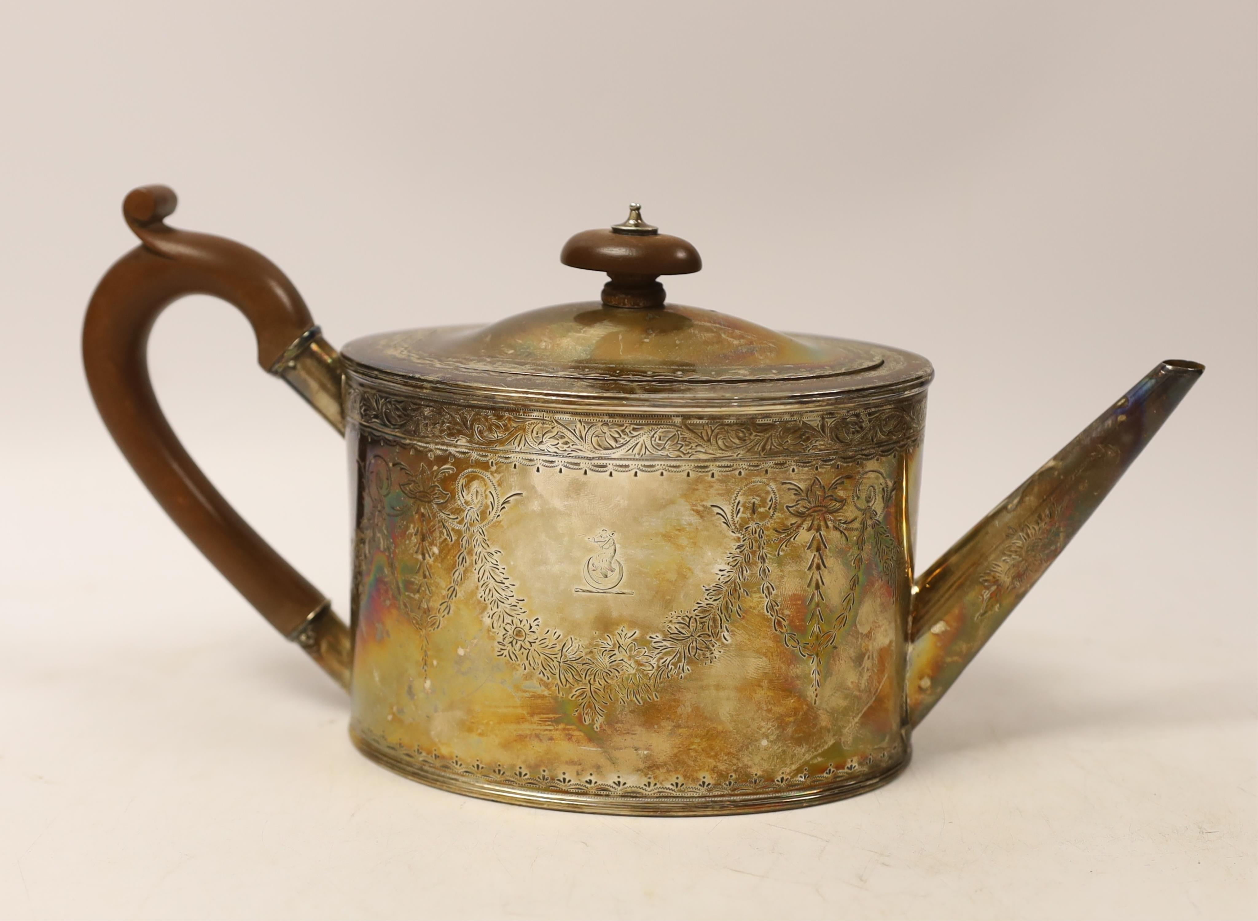 A George III engraved silver oval teapot, maker IF, London, 1792, gross weight 16.6oz.